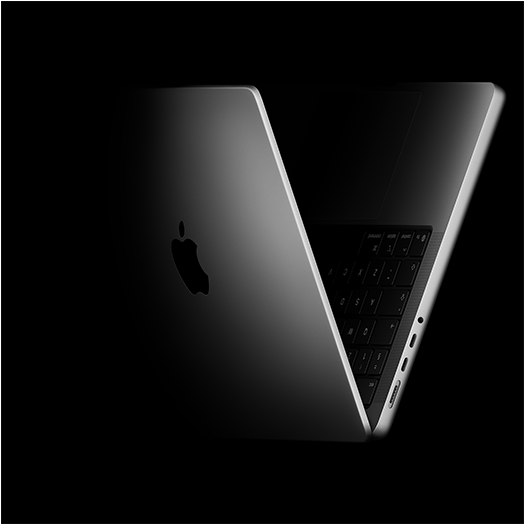 MacBook Pro positioned into the shape of a V, referencing the M5 chip