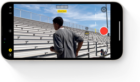 A frame of an Action mode clip showing a person running up a set of stairs.